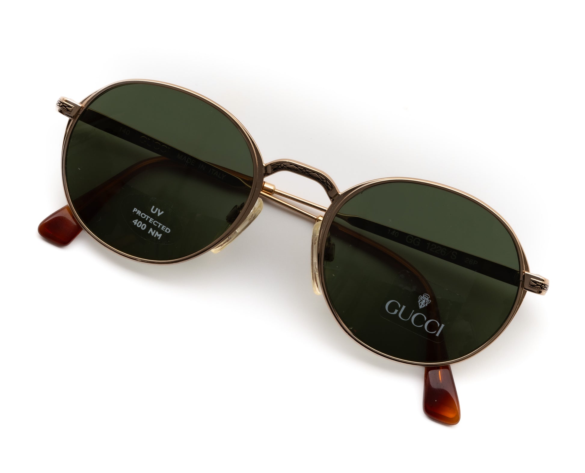 Odd Frames unique vintage gucci Round sunglasses with gold frame and dark green lenses GG 1226